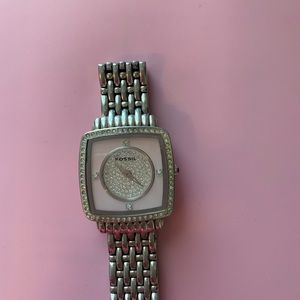 Fossil Silver Watch with pink face.